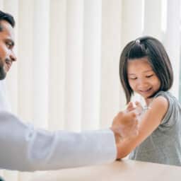 Young girl getting a meningitis vaccine